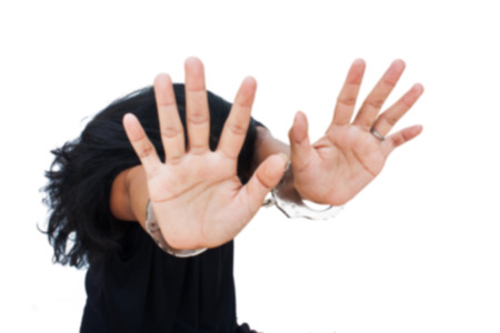 blurry -Slave,Human Trafficking concept,women hand in handcuffの写真素材