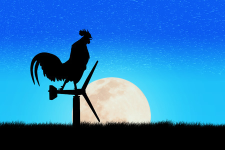 Roosters crow stand on a wind turbine. In the morning sunrise backgroundの写真素材