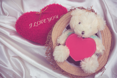 vintage sweet heart mini bear on white cloth