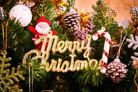 Merry Christmas on snow and wooden backgroundの写真素材