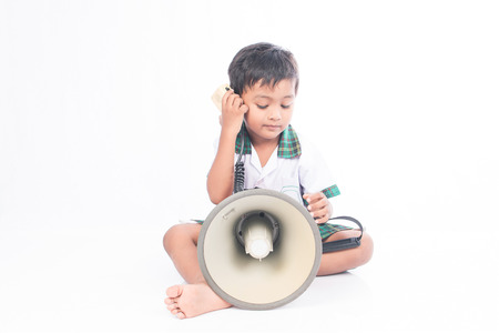 little boy play megaphoneの写真素材