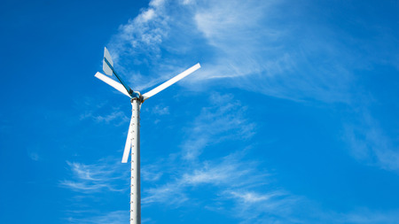 wind turbine on blue sky background
