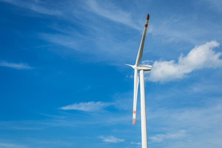 wind turbine on blue sky background