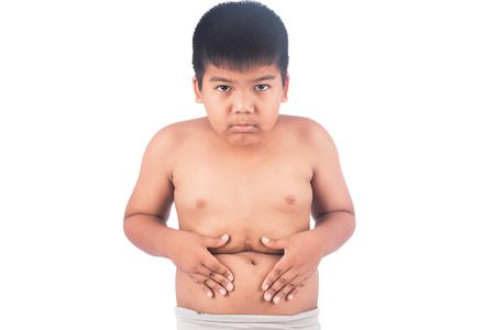 Cute little boy fat show bellyの写真素材