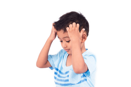 Cute child asian little boy scratching head