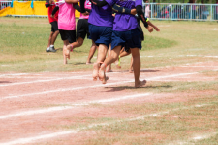 Blurry of three-legged race Sports in Thailandの写真素材