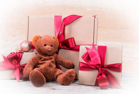 Cute teddy bear and gift boxの写真素材