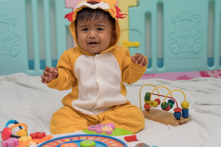 Cute little boy cryingの写真素材