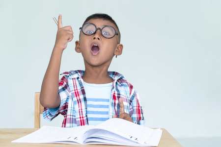 Cute little boy get thinkingの写真素材