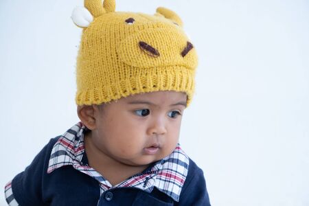 Cute little asian baby boy sitting and play toyの写真素材