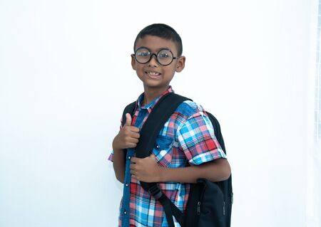 Cute little boy with  school bagの写真素材