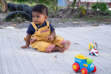 Cute little asian babyの写真素材
