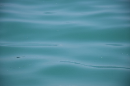 Green sea indicates depth, sea backgroundの写真素材