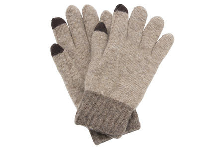 Brown woolen knitted gloves isolated on white backgroundの写真素材