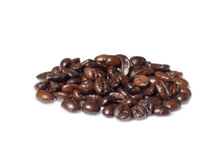 Roasted coffee beans on white backgroundの写真素材