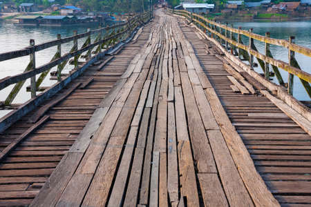A wooden bridge across the waterの写真素材