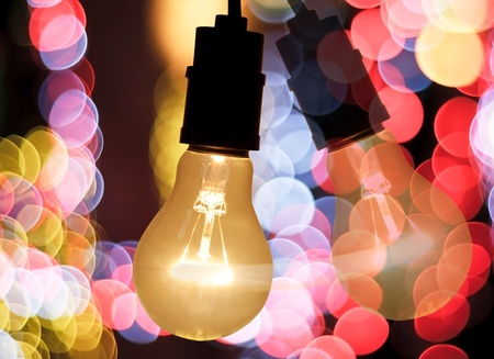 light bulb and bokeh blur backgroundの写真素材