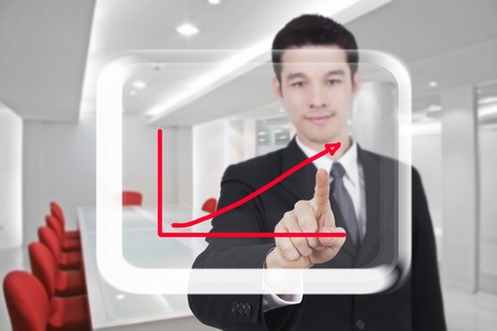 business man touch screen in conference roomの写真素材