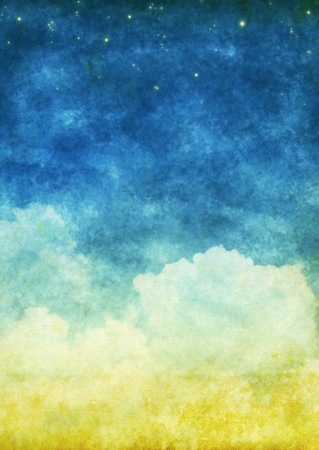 cloud and sky on an old grunge paperの写真素材