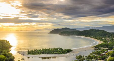 Spectacular sunset on the Barra do Una beach on the coast of the state of Sao Paulo , Brazilの写真素材