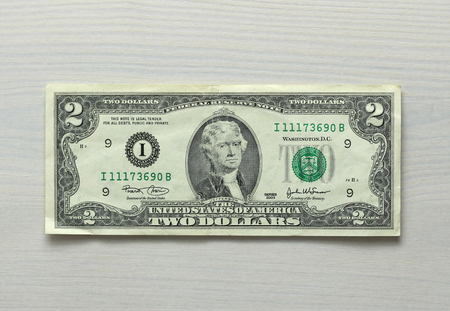 Two dollars with one note. 2 dollars with one banknote.