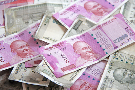 Indian money and banknotes, 500 rupees and 2,000 rupees. Background of paper Indian money.