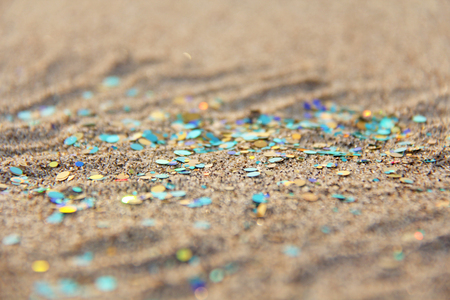 Green, blue or turquoise Soft Blurred Boke Background. Spangles and Shiny Silver Color Background. Bright Background. Glamorous background for your design and decoration. Sparkles on the sand. Magic.の写真素材