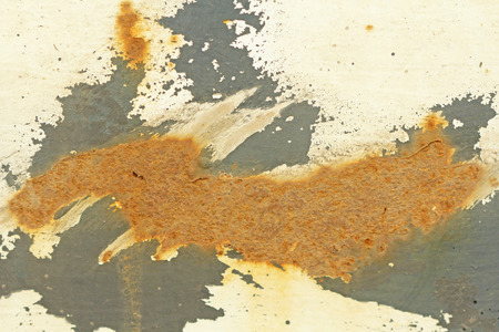 Rusty paint. Corrosion of metal. Rusty gray background.