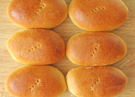 breads on a wooden board.