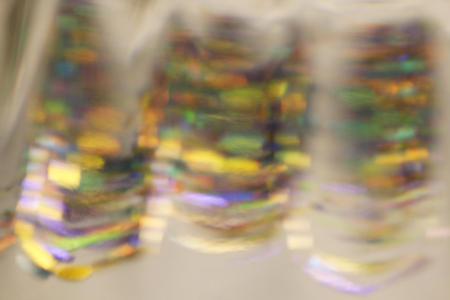 Blurred abstract creative background. Green yellow background. Lens flare. Colorful bokeh light....
