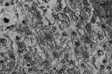 Gray background of stone. The structure of the stone. Design with copy space.