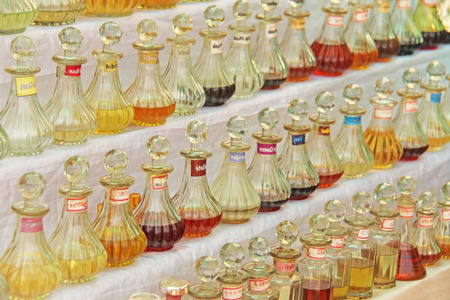 Perfume India. Oily Spirits India. Many beautiful bottles are in a row in the market bazaar of...