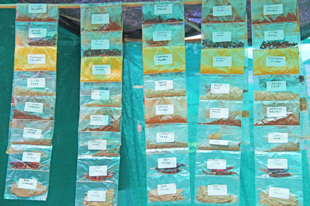 Sets of Spices in transparent bags on the market in India. Spices India.の写真素材
