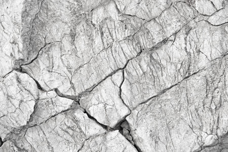 Background Of Gray Rocks. Cracked Stones. Empty Gray Background for Your Design and Decoration.