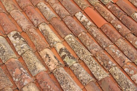 Roof of Tiles. Terracotta Old Tiles. Beige Background from Tiles. Tile roof.