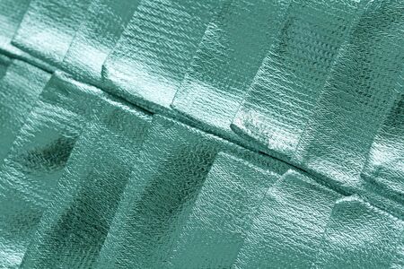 Blue or Turquoise Metallic Bright and Brilliant Background from Fotlga. Beautiful Glamorous Background for Your Design, Cover Design, Postcard. Blue or Turquoise Background.の写真素材