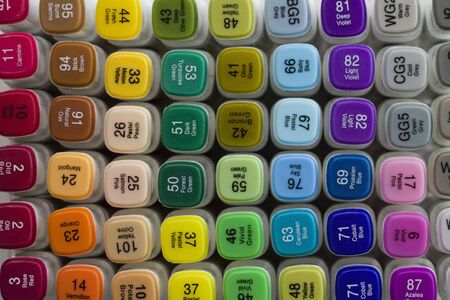 Set of bright multi-colored felt-tip pens or markers with designation of numbers and the name of color. Photo for creativity, drawing for children, design. Many Markers of all colors of the rainbow.の写真素材
