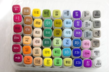 Set of bright multi-colored felt-tip pens or markers with designation of numbers and the name of color. Photo for creativity, drawing for children, design. Many Markers of all colors of the rainbow.の写真素材