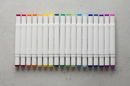 Set bright multi-colored felt-tip pens or markers with designation numbers, name of color. Creativity, drawing for children, design. Many Markers of all colors of rainbow. Copy space for your text.の写真素材