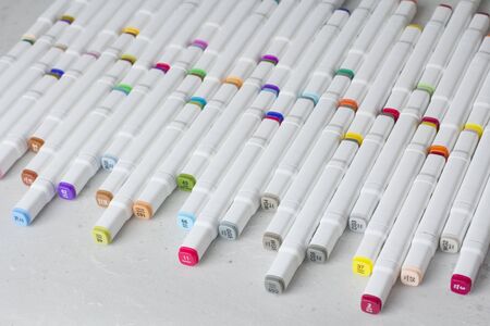 Set bright multi-colored felt-tip pens or markers with designation numbers, name of color. Creativity, drawing for children, design. Many Markers of all colors of rainbow. Copy space for your text.の写真素材