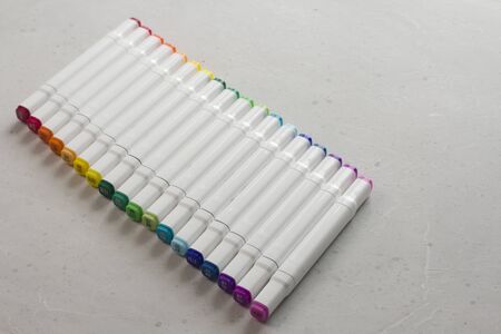 Set bright multi-colored felt-tip pens or markers with designation numbers, name of color. Creativity, drawing for children, design. Many Markers of all colors of rainbow. Copy space for your text.の写真素材