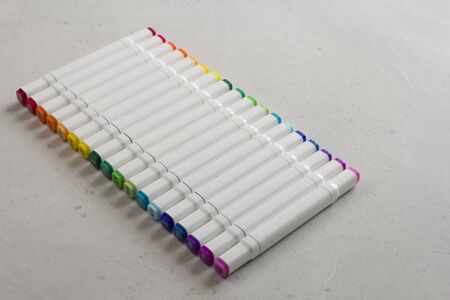 Set bright multi-colored felt-tip pens or markers with designation numbers, name of color. Creativity, drawing for children, design. Many Markers of all colors of rainbow. Copy space for your text.の写真素材