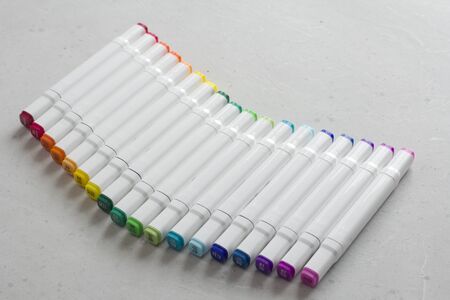 Set bright multi-colored felt-tip pens or markers with designation numbers, name of color. Creativity, drawing for children, design. Many Markers of all colors of rainbow. Copy space for your text.の写真素材