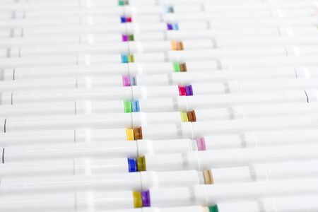 Set bright multi-colored felt-tip pens or markers with designation numbers, name of color. Creativity, drawing for children, design. Many Markers of all colors of rainbow. Copy space for your text.の写真素材
