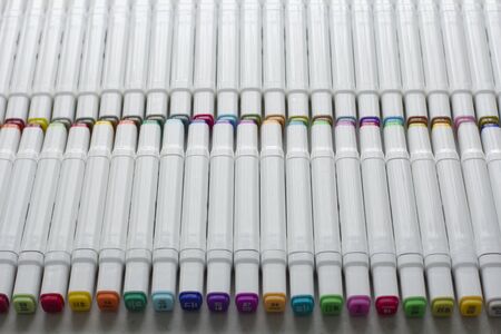 Set bright multi-colored felt-tip pens or markers with designation numbers, name of color. Creativity, drawing for children, design. Many Markers of all colors of rainbow. Copy space for your text.の写真素材