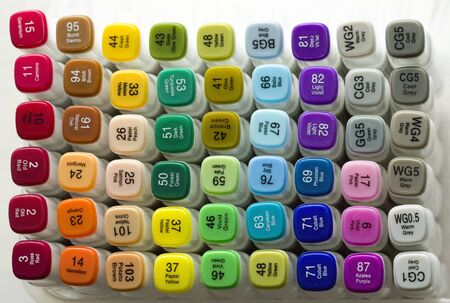 Set of bright multi-colored felt-tip pens or markers with designation of numbers and the name of color. Photo for creativity, drawing for children, design. Felt pens of all colors of the rainbow.の写真素材