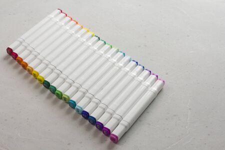 Set bright multi-colored felt-tip pens or markers with designation numbers, name of color. Creativity, drawing for children, design. Many Markers of all colors of rainbow. Copy space for your text.の写真素材