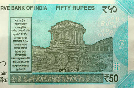 A new banknote of India with a denomination of 50 rupees. Indian currency. The other side, Hampi's chariot.のeditorial素材