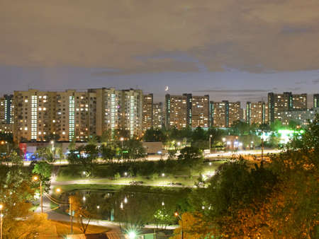 Lights of the night city of Moscow. Lights are reflected in the water at night. Megapolis Moscow.の写真素材