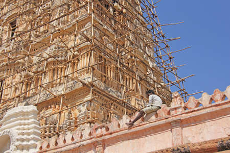 India, Hampi. February 1, 2018. The man restores Shiva Virupaksha Temple.のeditorial素材